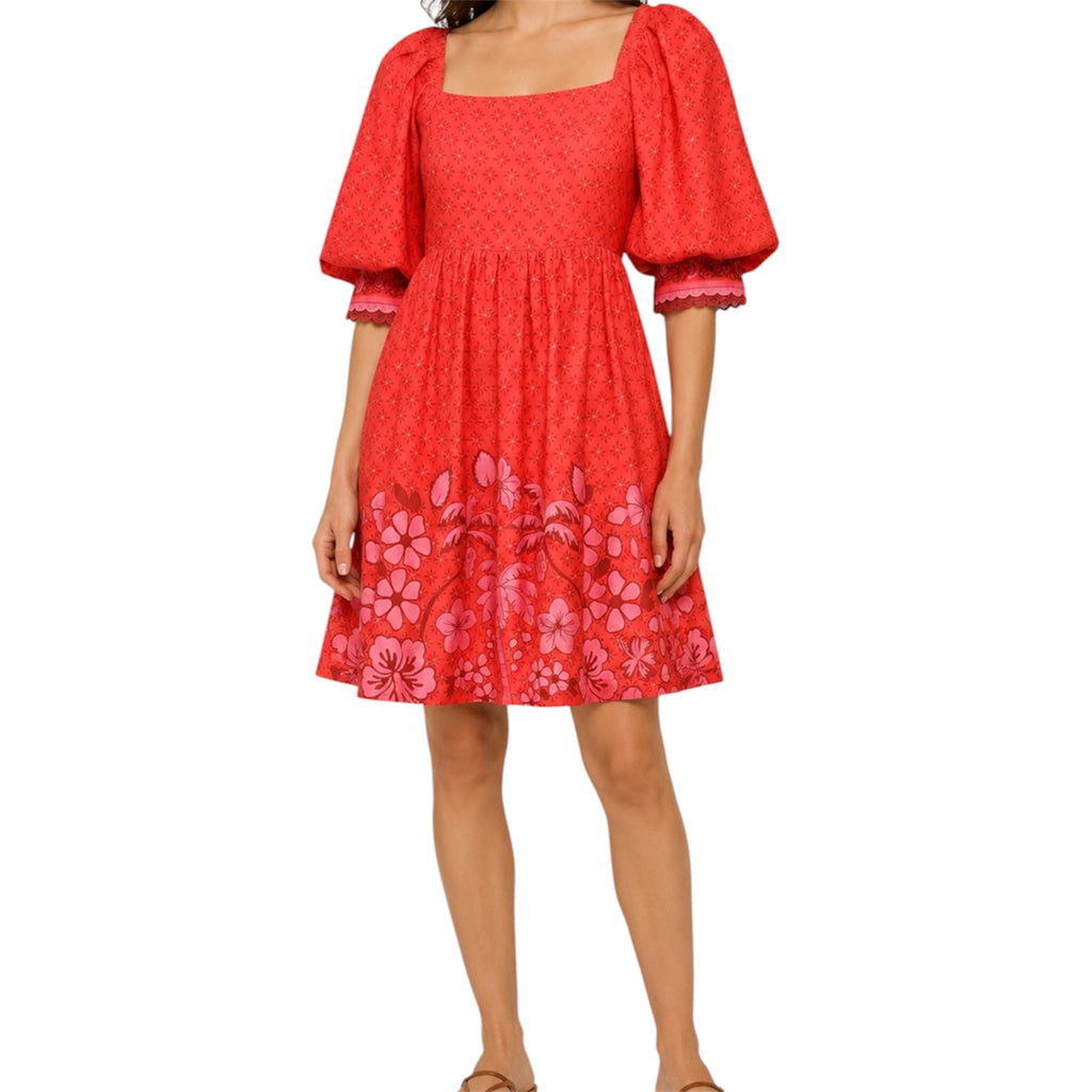 Red-orange floral dress with puff sleeves and pockets by Emily Lovelock